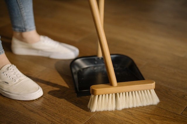 sweeping broom and dustpan